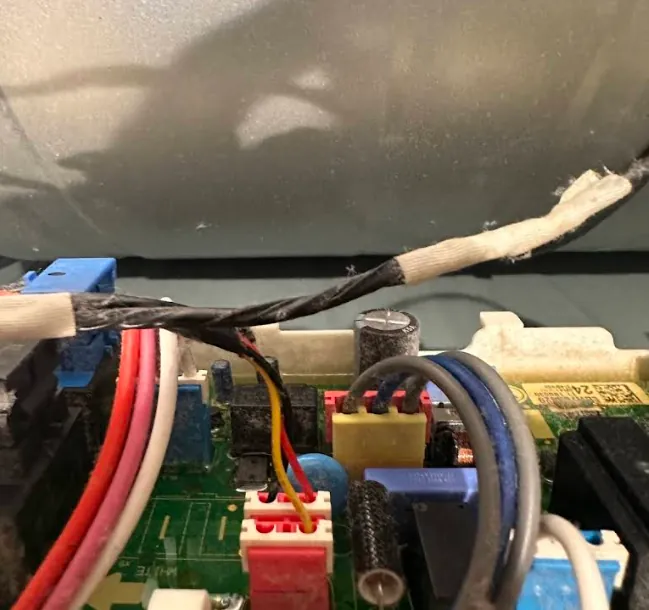 Control board and wiring opened up for testing